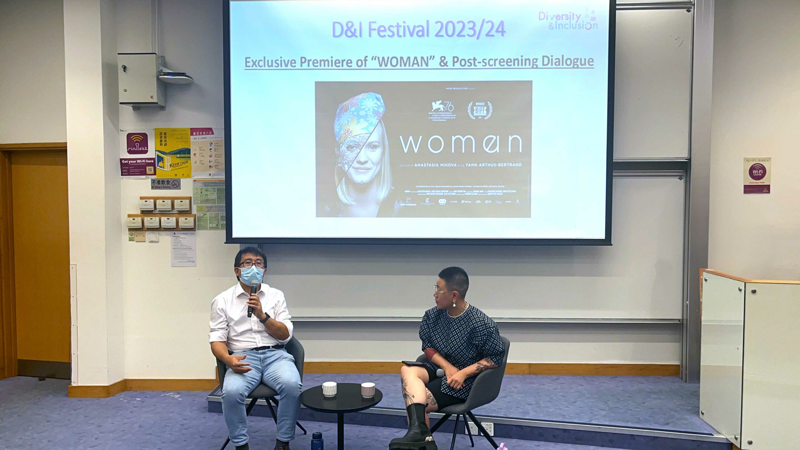 The two speakers, Professor Lee Tan and Dr. Sonia Wong, are sharing their insights during the post-screening dialogue session.